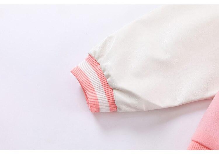 Men's varsity jacket featuring bear embroidery and patchwork design, perfect for autumn and winter wear.