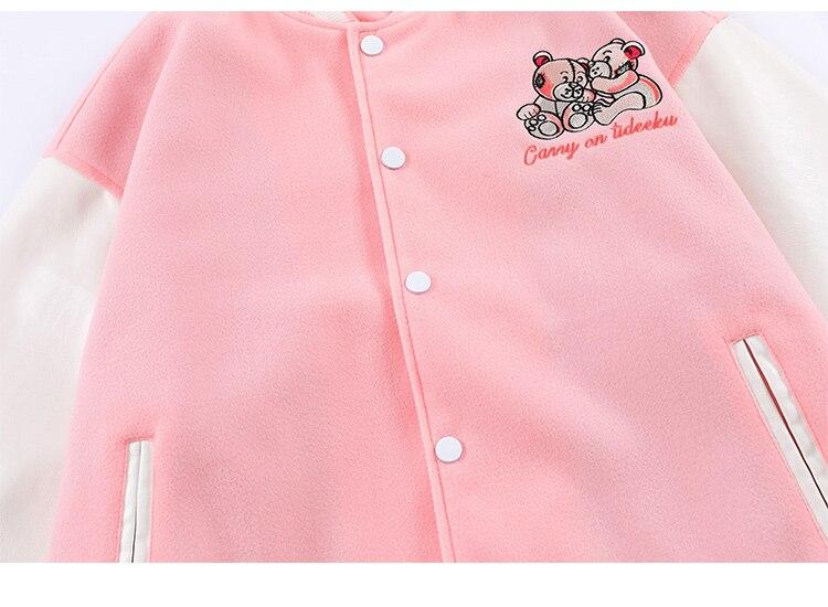 Men's varsity jacket featuring bear embroidery and patchwork design, perfect for autumn and winter wear.