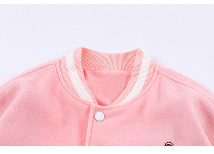 Men's varsity jacket featuring bear embroidery and patchwork design, perfect for autumn and winter wear.