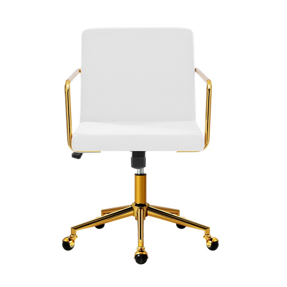 Caraway Velvet Office Chair with metallic brass base and armrests, featuring luxurious white upholstery and smooth ball-shaped castors.