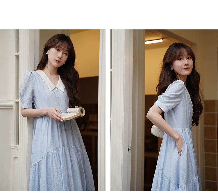 A stylish Vertical Texture Lightweight Short Sleeve Dress displayed on a mannequin, showcasing its unique texture and short sleeves.