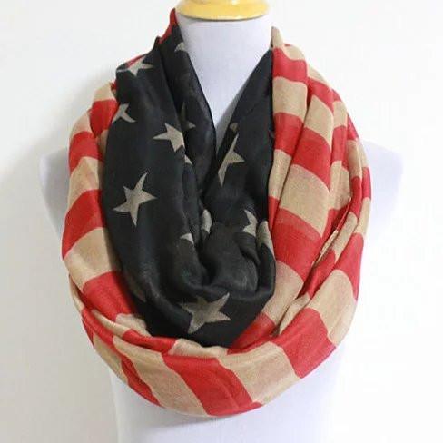 A stylish Vintage Inspired American Flag Infinity Scarf displayed elegantly, showcasing its oversized design and patriotic colors.