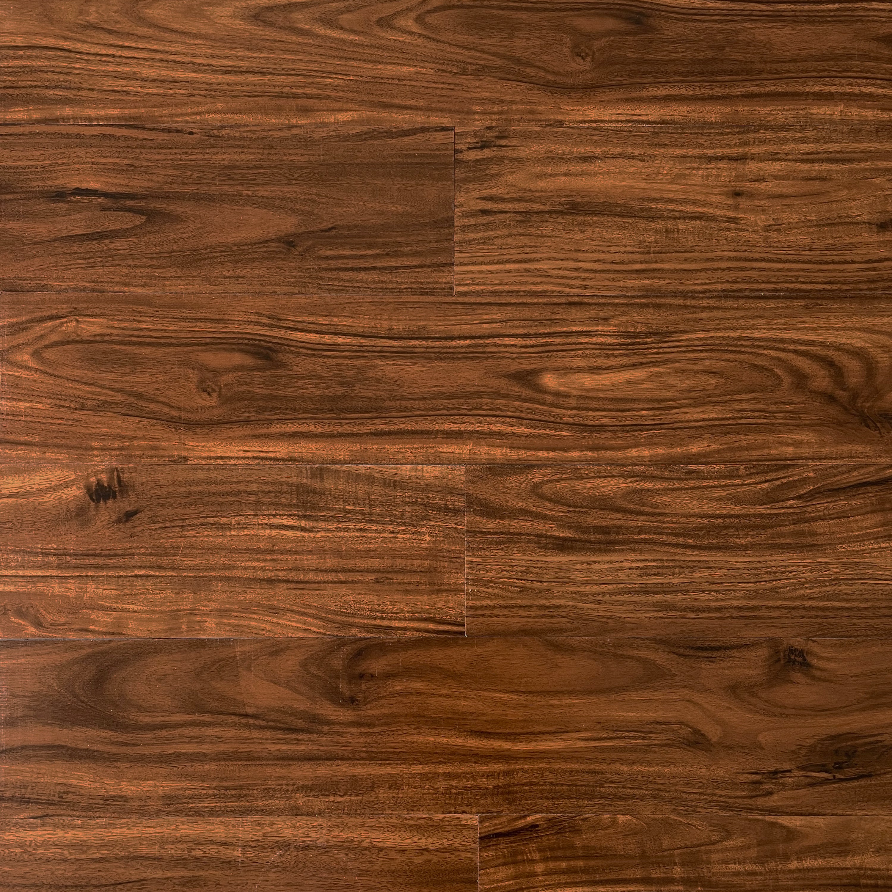 Self-adhesive vinyl floor tiles featuring a realistic walnut wood grain design, perfect for home renovation.