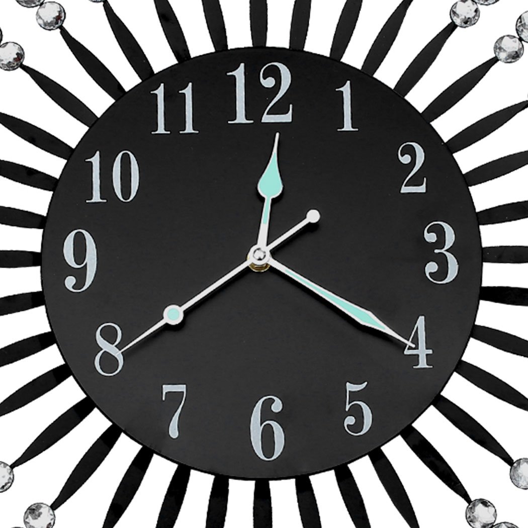 A luxurious large round wall clock with a sleek metal frame and sparkling transparent crystals, designed for modern home and office decor.