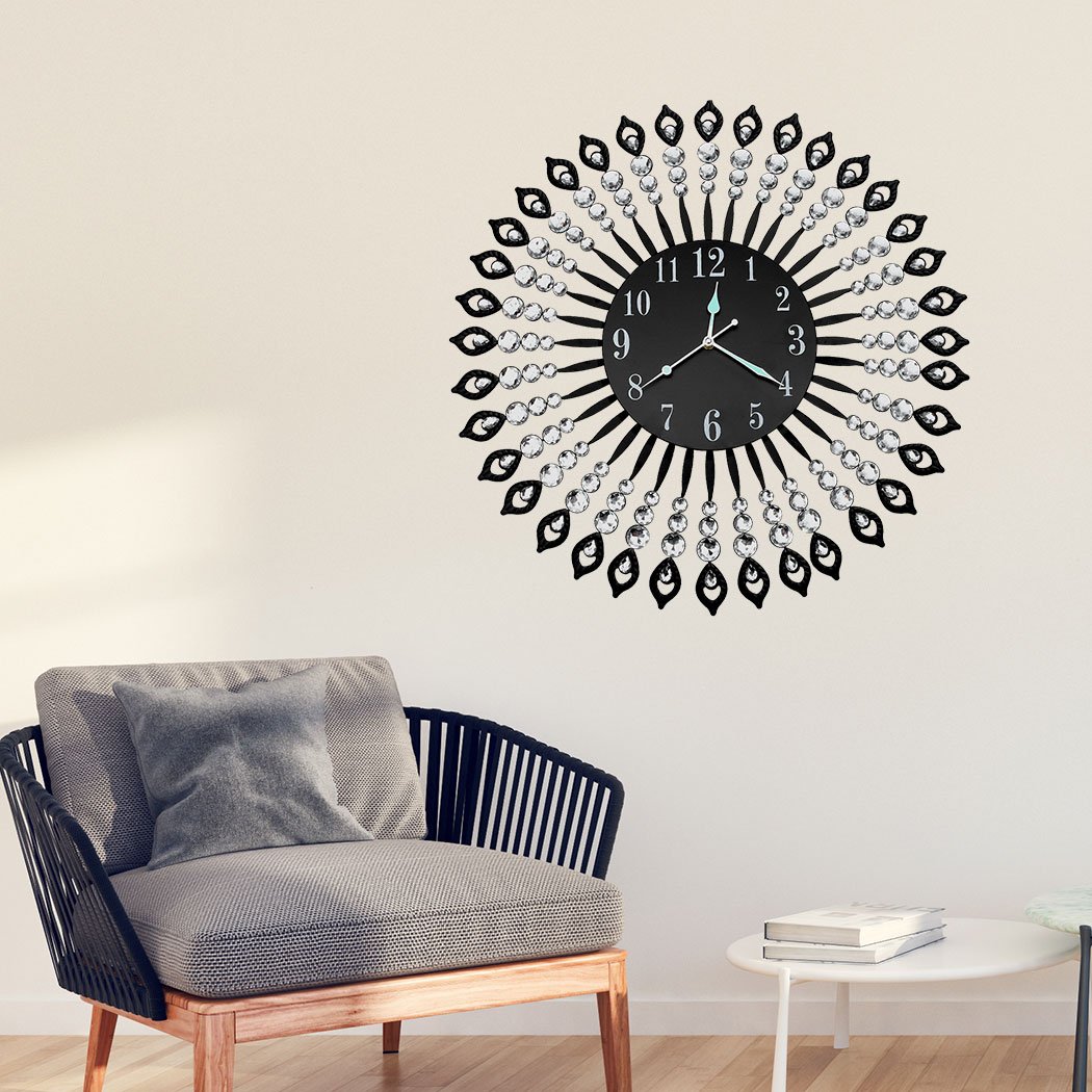 A luxurious large round wall clock with a sleek metal frame and sparkling transparent crystals, designed for modern home and office decor.