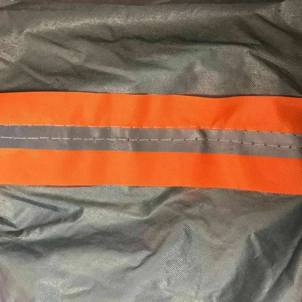 Waterproof adjustable large car cover protecting a vehicle from rain and sun, featuring reflective strips and zippers.