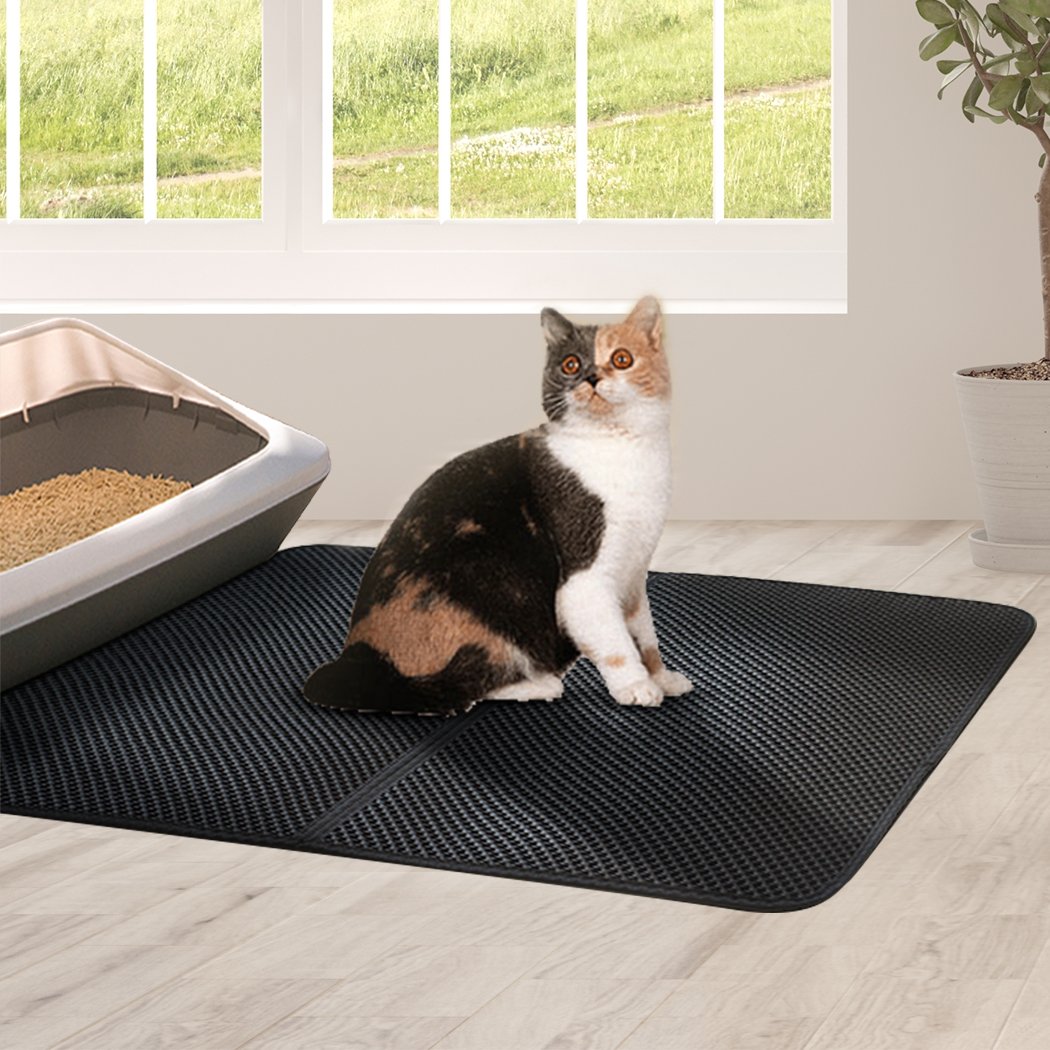Waterproof double-layer cat litter mat trapper in grey, designed to trap litter and prevent mess, featuring a foldable design for easy storage.
