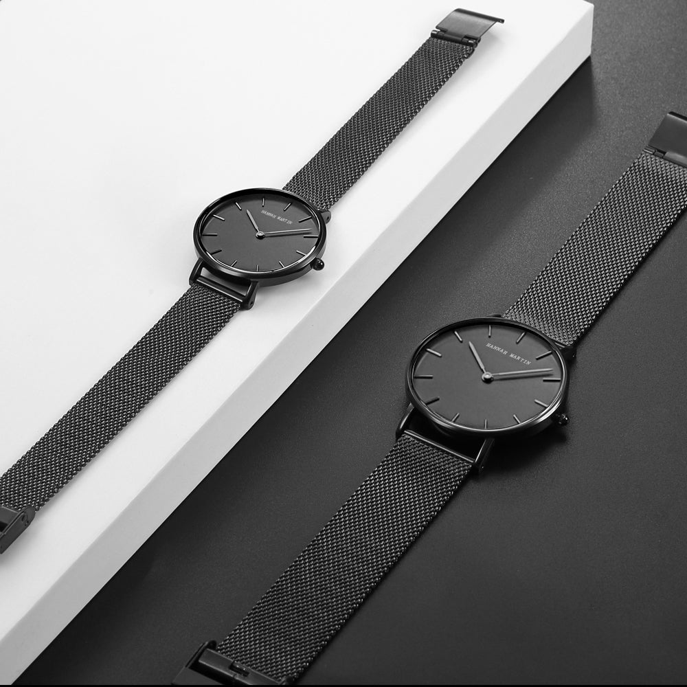 A stylish black watch featuring a waterproof Japan quartz movement and a stainless steel mesh band, perfect for men.