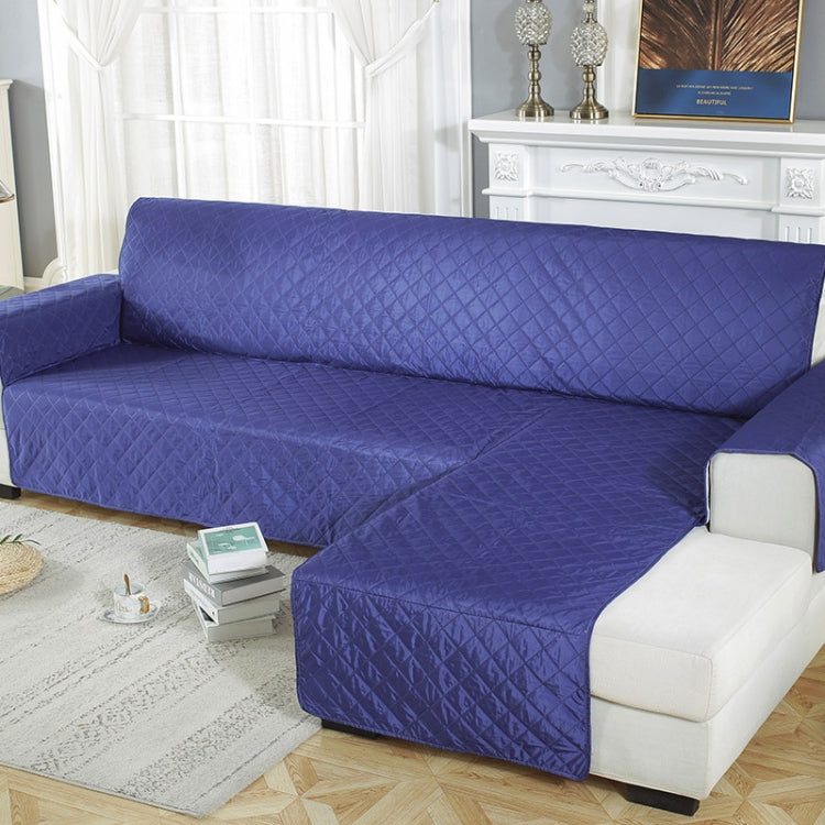 Waterproof non-slip pet cushion sofa cover in a cozy living room setting, showcasing its durable fabric and secure fit.