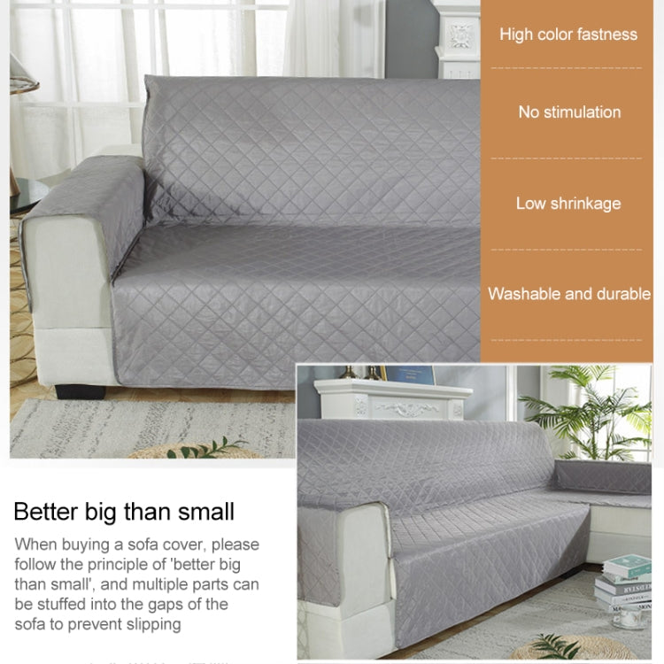Waterproof non-slip pet cushion sofa cover in a cozy living room setting, showcasing its durable fabric and secure fit.