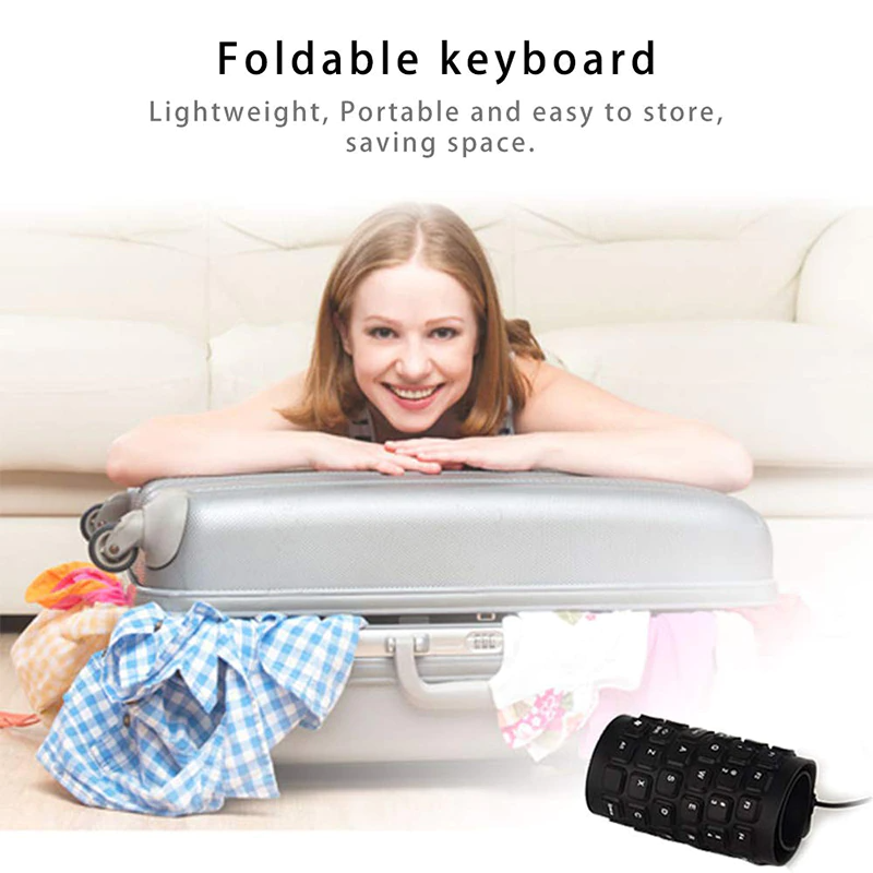 A flexible and foldable waterproof silicone keyboard in black, showcasing its USB connection and dustproof features.