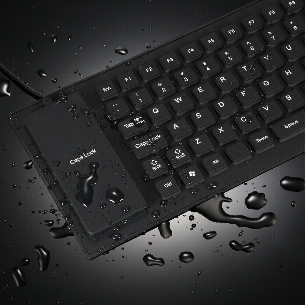 A flexible and foldable waterproof silicone keyboard in black, showcasing its USB connection and dustproof features.
