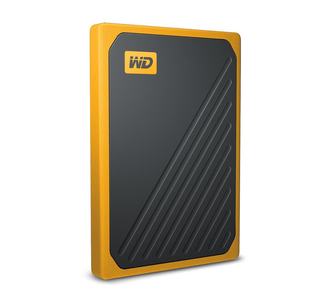 WD My Passport Go 2TB External Portable SSD in amber yellow with built-in cable, showcasing its tough and durable design.