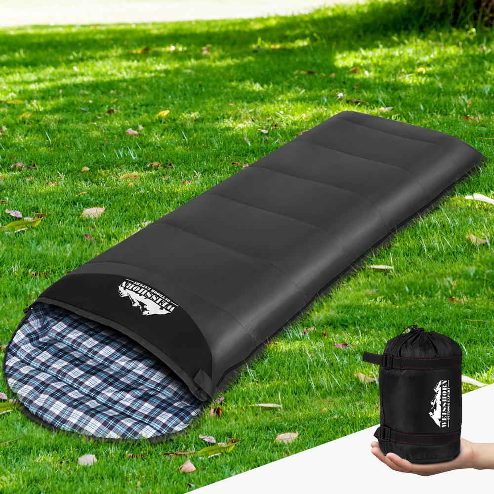 Weisshorn Sleeping Bag in grey, showcasing its compact design and features for camping and hiking.