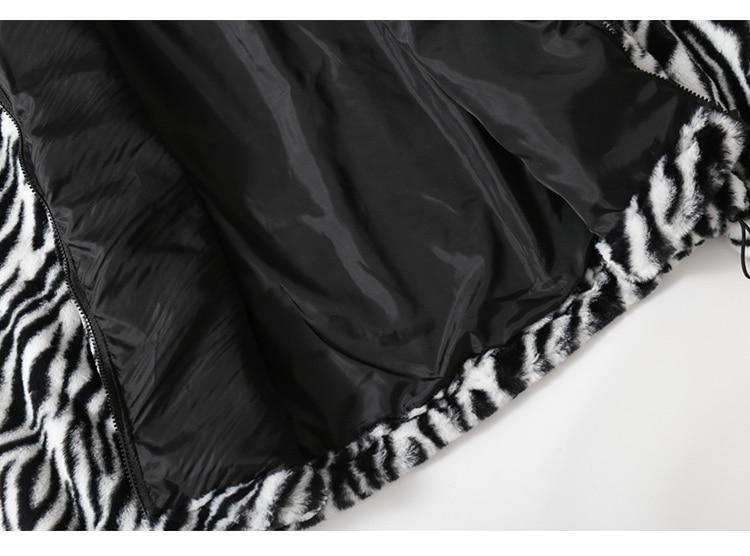 Men's winter jacket featuring heart embroidery and zebra striped print, designed for warmth and style.