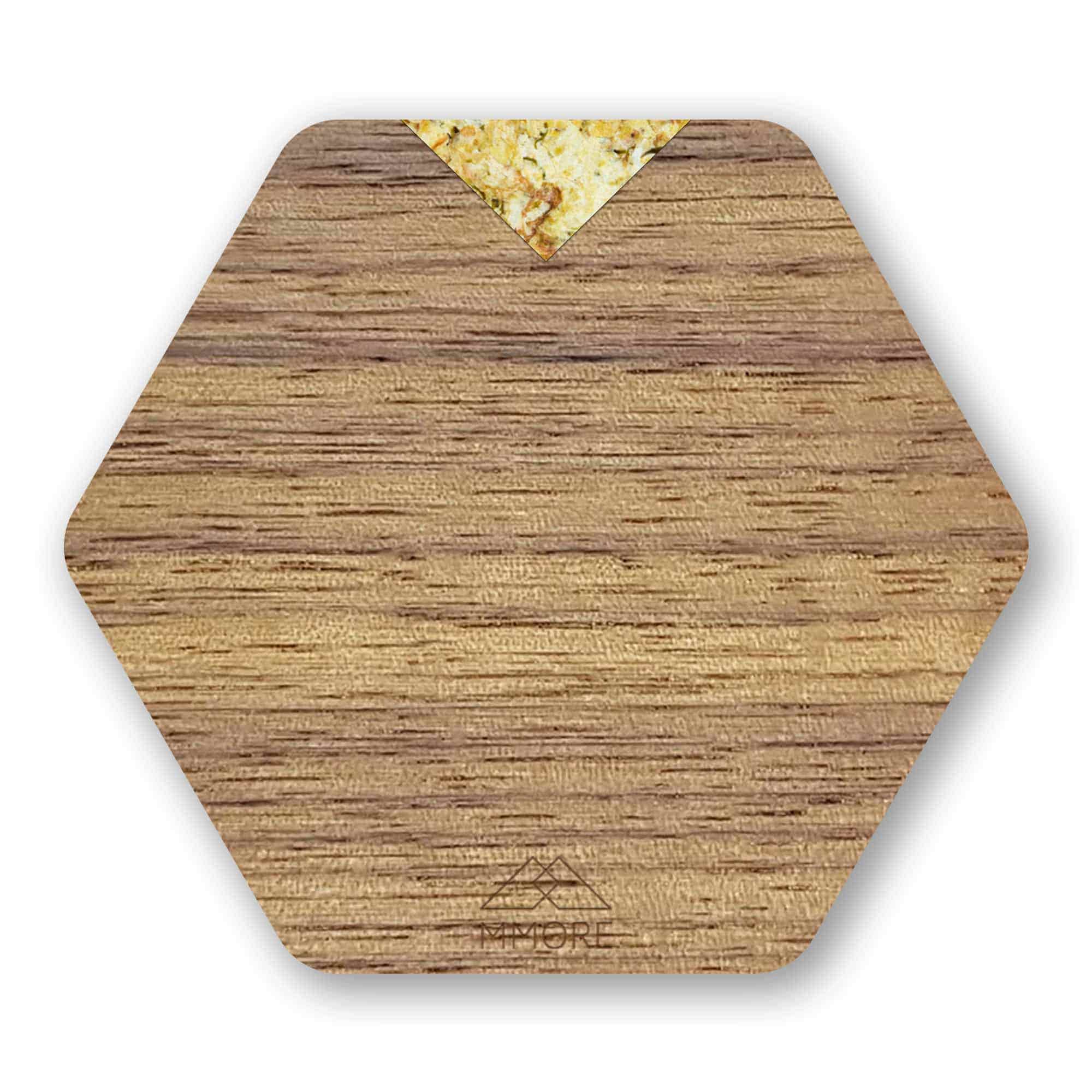 Set of four handcrafted wooden coasters made from American Walnut, showcasing unique grain patterns and a stylish hexagonal shape.