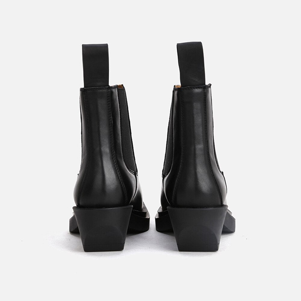 Woman's ankle boots made of genuine leather with a square heel and square toe, featuring a slip-on design and plush lining.