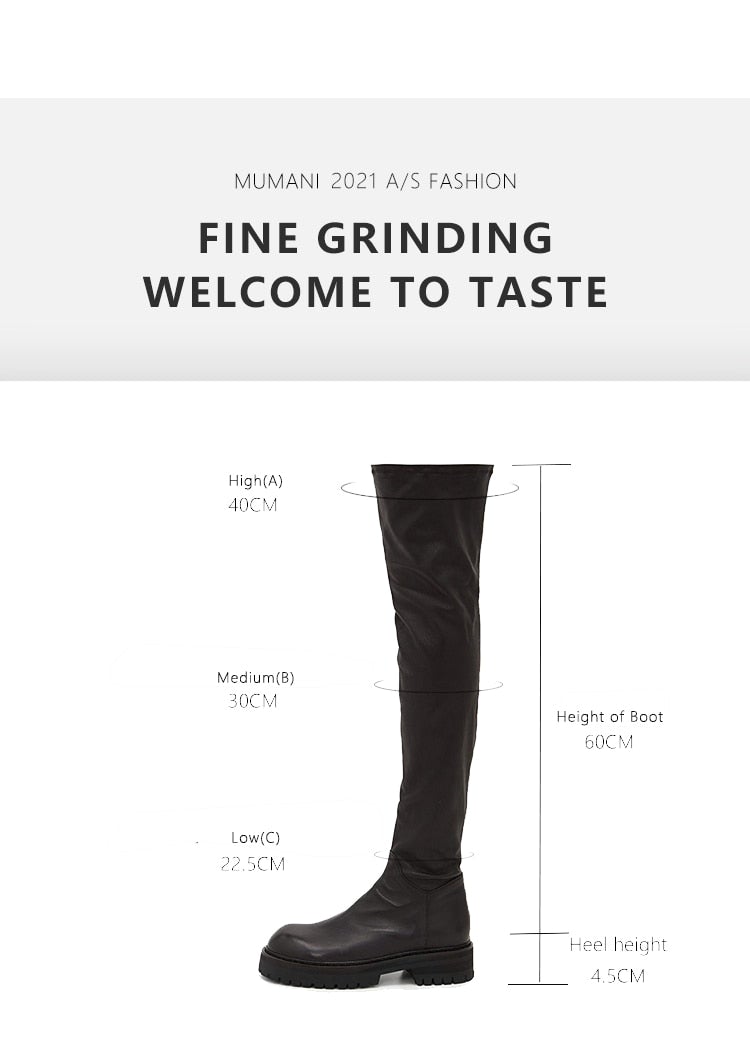 A pair of stylish black over-the-knee boots made from genuine leather, featuring a zipper closure and elastic design for a comfortable fit.