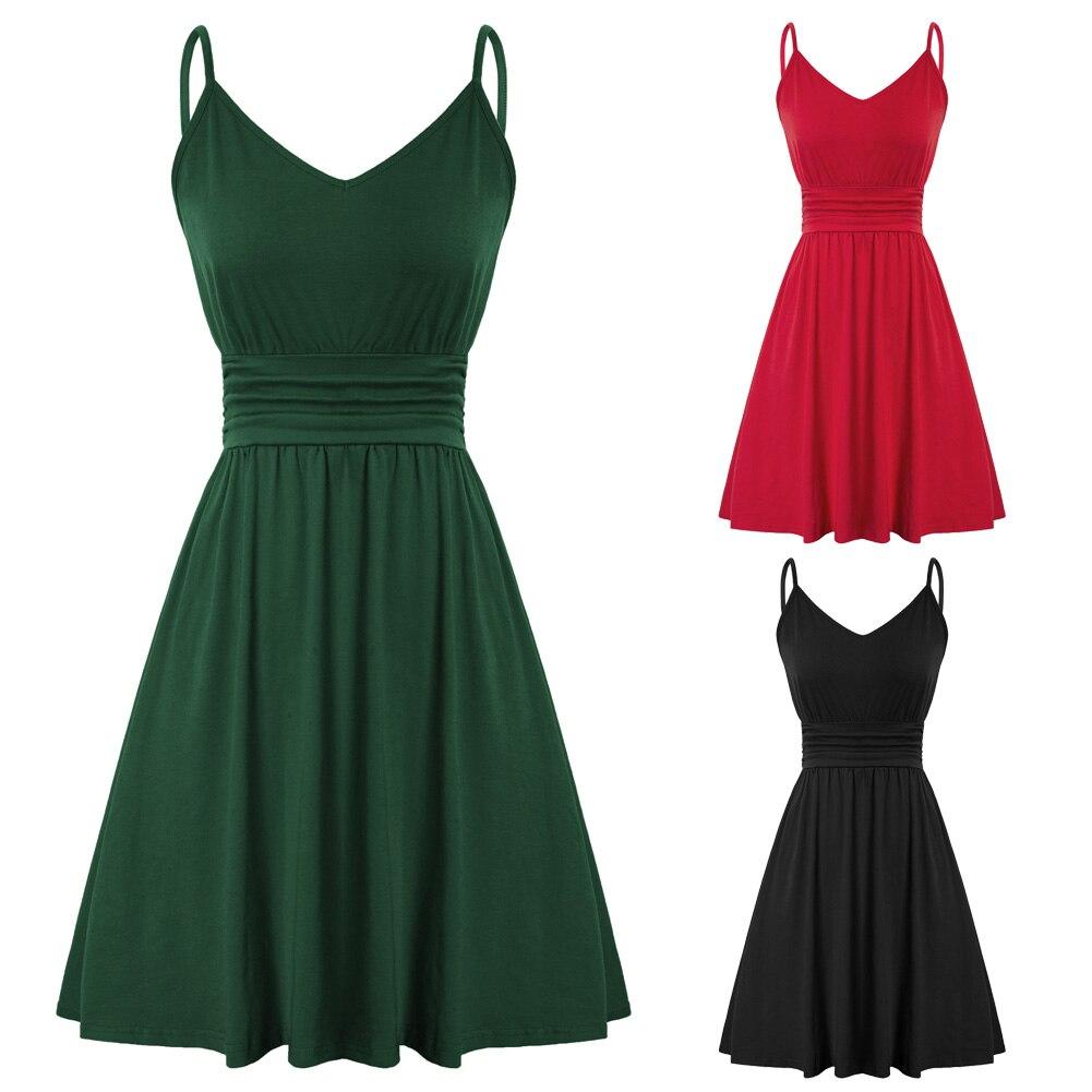 A stylish women’s dress featuring spaghetti straps, a V-neckline, and a pleated waist in a solid color, perfect for summer outings.