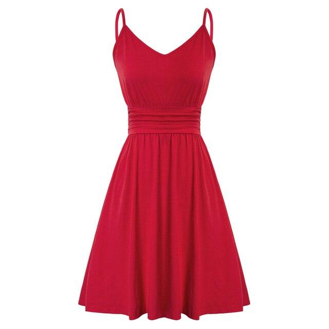 A stylish women’s dress featuring spaghetti straps, a V-neckline, and a pleated waist in a solid color, perfect for summer outings.