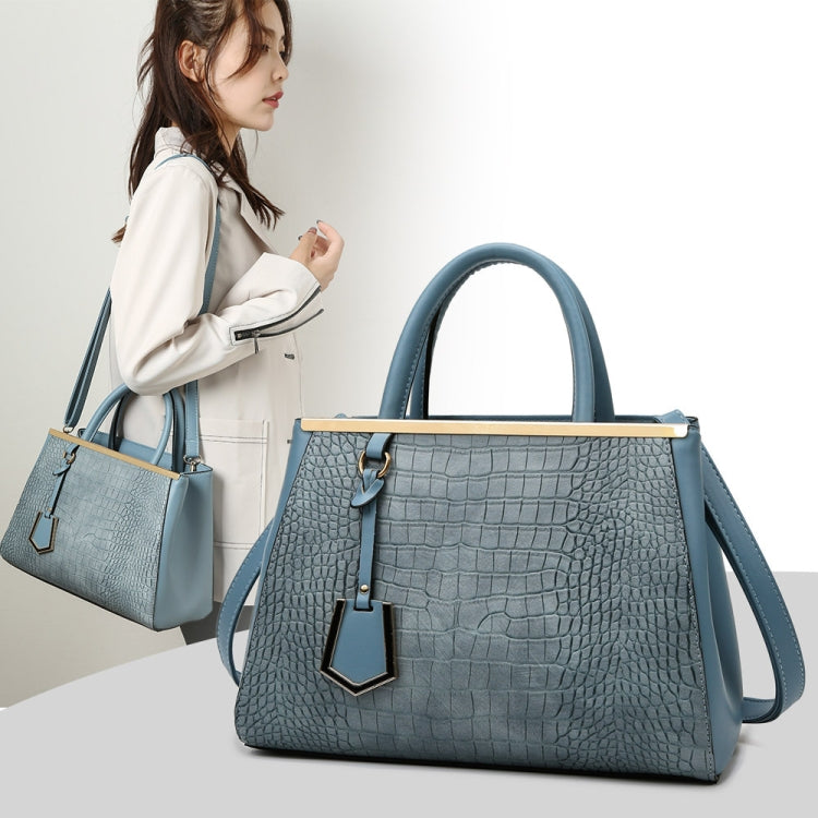 Women Stone Pattern Patchwork Handbag in blue, showcasing its elegant design and spacious interior.