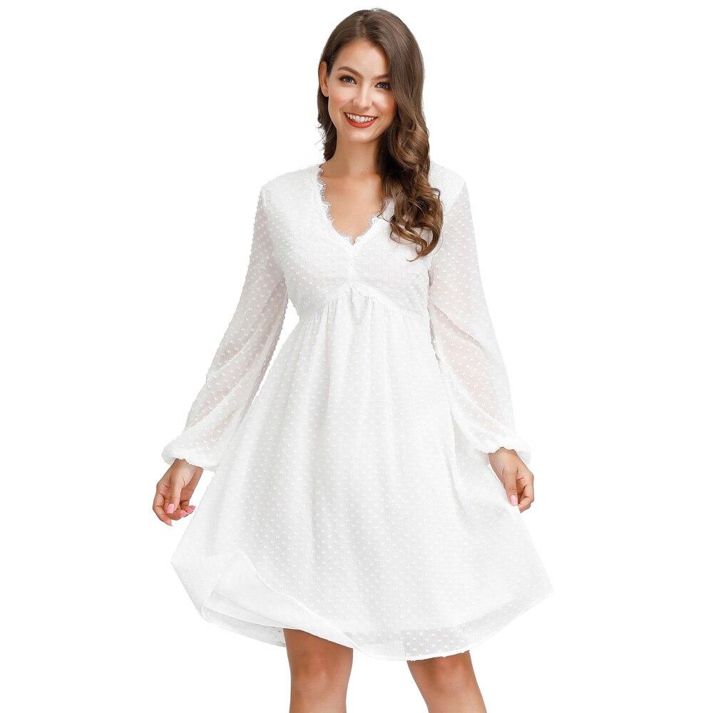 A stylish Women's V-Neck Empire Waist Swing Dress featuring full lantern sleeves and a flared A-line silhouette, perfect for summer occasions.