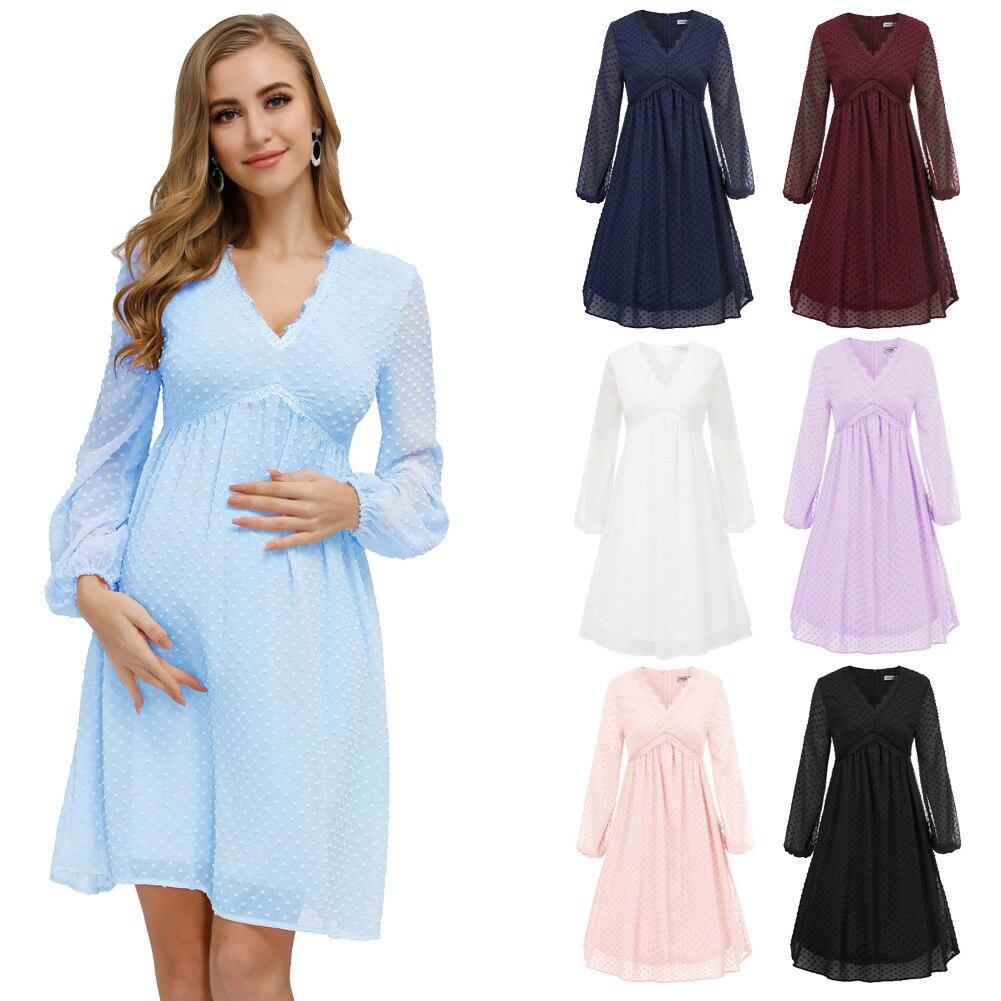 A stylish Women's V-Neck Empire Waist Swing Dress featuring full lantern sleeves and a flared A-line silhouette, perfect for summer occasions.
