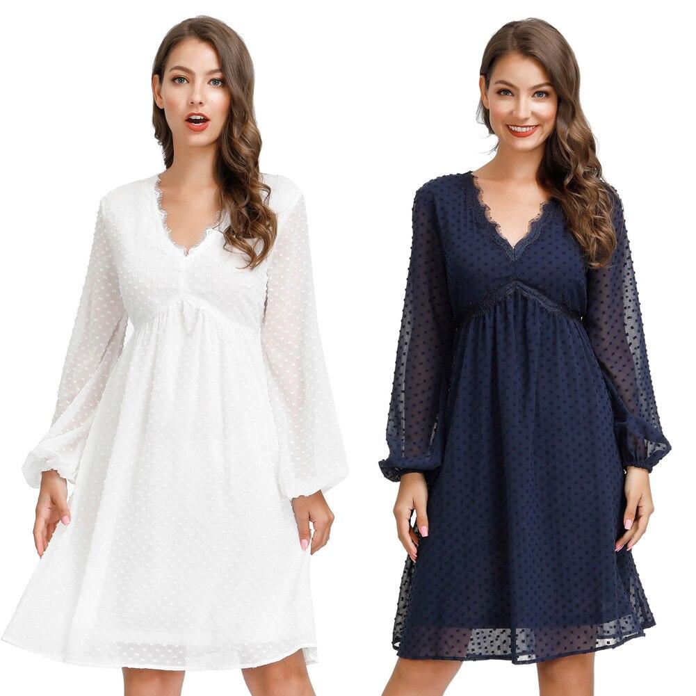 A stylish Women's V-Neck Empire Waist Swing Dress featuring full lantern sleeves and a flared A-line silhouette, perfect for summer occasions.