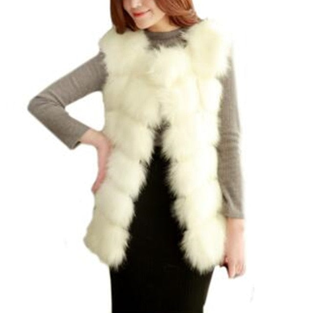 Women's faux fur vest coat in silver, featuring a warm V-neck design and luxurious faux fur material, perfect for winter fashion.