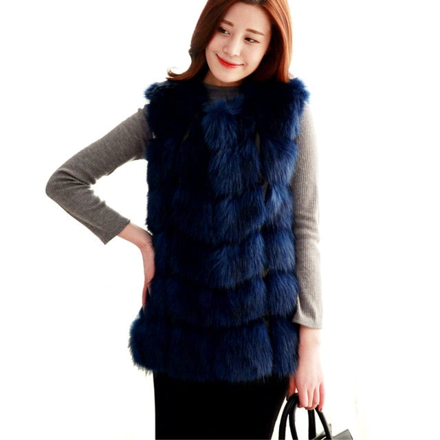 Women's faux fur vest coat in silver, featuring a warm V-neck design and luxurious faux fur material, perfect for winter fashion.
