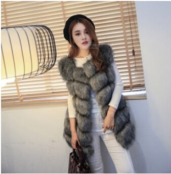 Women's faux fur vest coat in silver, featuring a warm V-neck design and luxurious faux fur material, perfect for winter fashion.