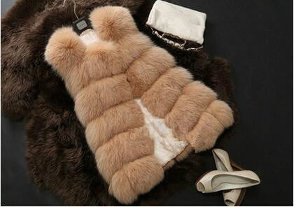 Women's faux fur vest coat in silver, featuring a warm V-neck design and luxurious faux fur material, perfect for winter fashion.