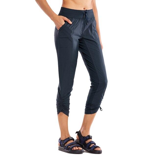 Women's Go to Studio Jogger Striped Cargo Pants featuring a drawstring leg and 7/8 length, perfect for workouts and casual wear.
