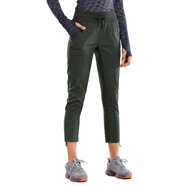 Women's Go to Studio Jogger Striped Cargo Pants featuring a drawstring leg and 7/8 length, perfect for workouts and casual wear.