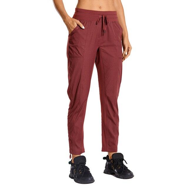 Women's Go to Studio Jogger Striped Cargo Pants featuring a drawstring leg and 7/8 length, perfect for workouts and casual wear.