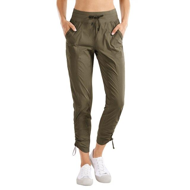 Women's Go to Studio Jogger Striped Cargo Pants featuring a drawstring leg and 7/8 length, perfect for workouts and casual wear.