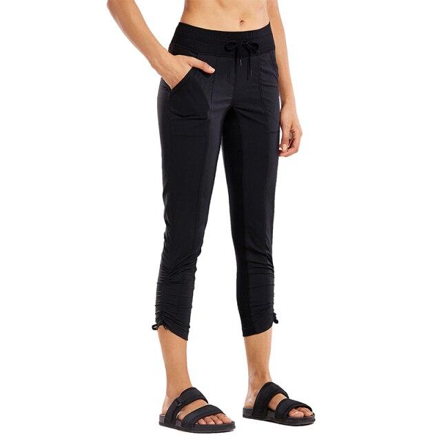 Women's Go to Studio Jogger Striped Cargo Pants featuring a drawstring leg and 7/8 length, perfect for workouts and casual wear.