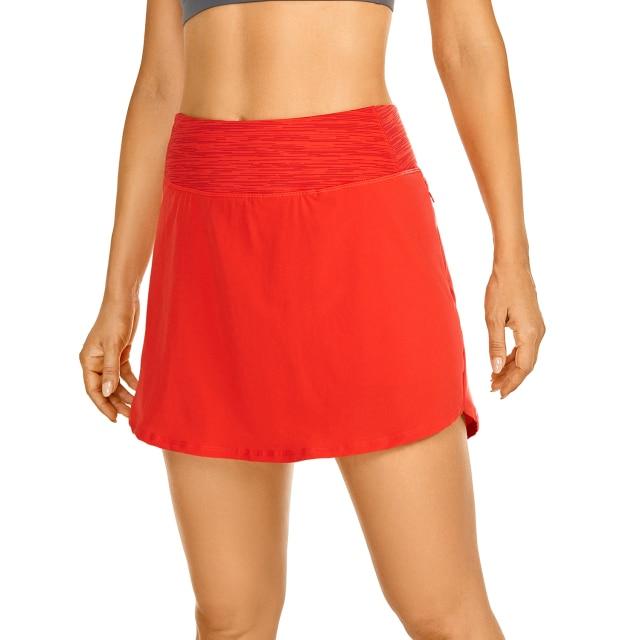 Women's lightweight athletic skorts in solid color with zipper pocket, perfect for tennis and golf.