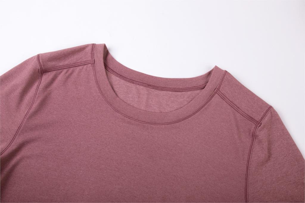 Women's Lightweight Heather Loose Fit Short Sleeve Sport Shirt in a stylish heather design, perfect for workouts and yoga.