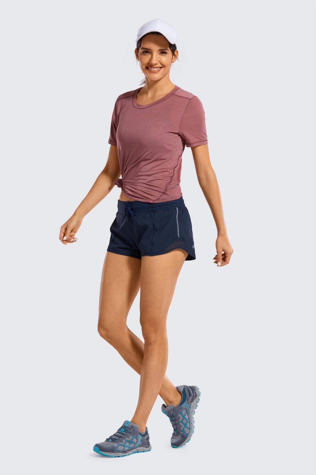 Women's Lightweight Heather Loose Fit Short Sleeve Sport Shirt in a stylish heather design, perfect for workouts and yoga.