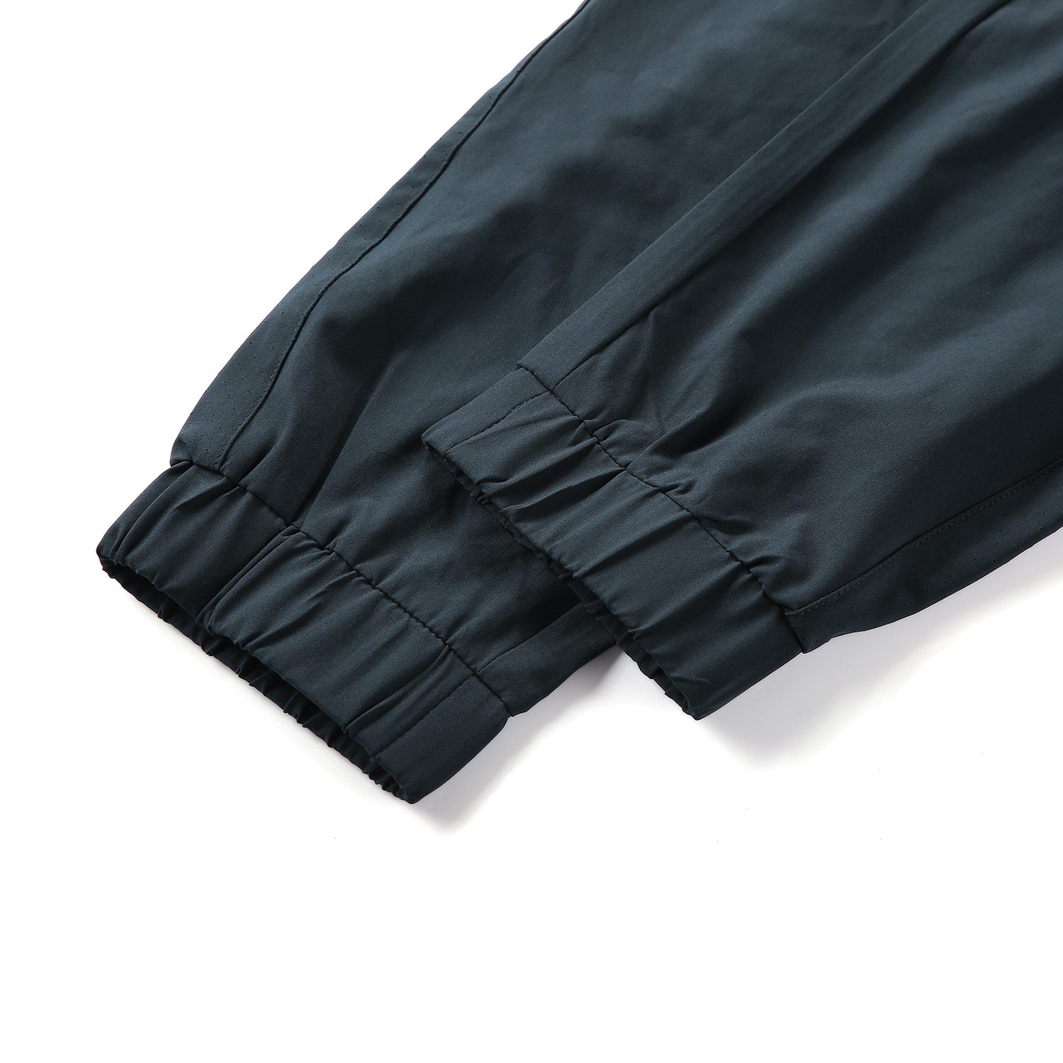 A pair of women's lightweight joggers pants in black with pockets and a drawstring elastic waist, perfect for athletic and casual wear.