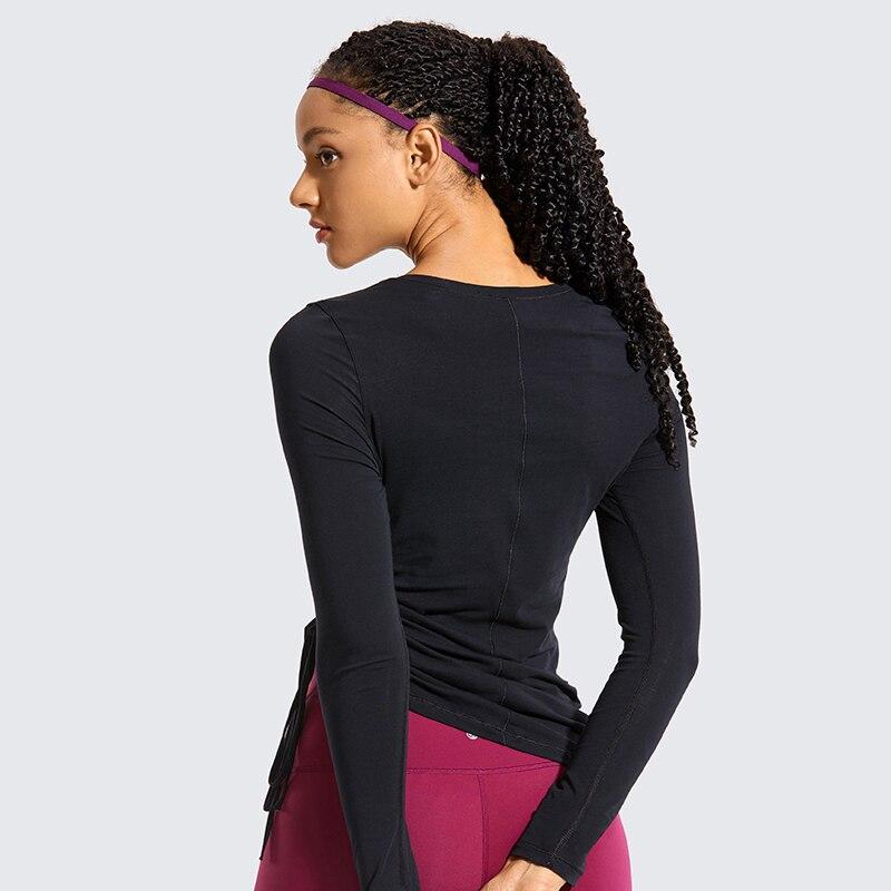 Women's long-sleeve Pima cotton workout shirt in crewneck style, ideal for gym and casual wear.