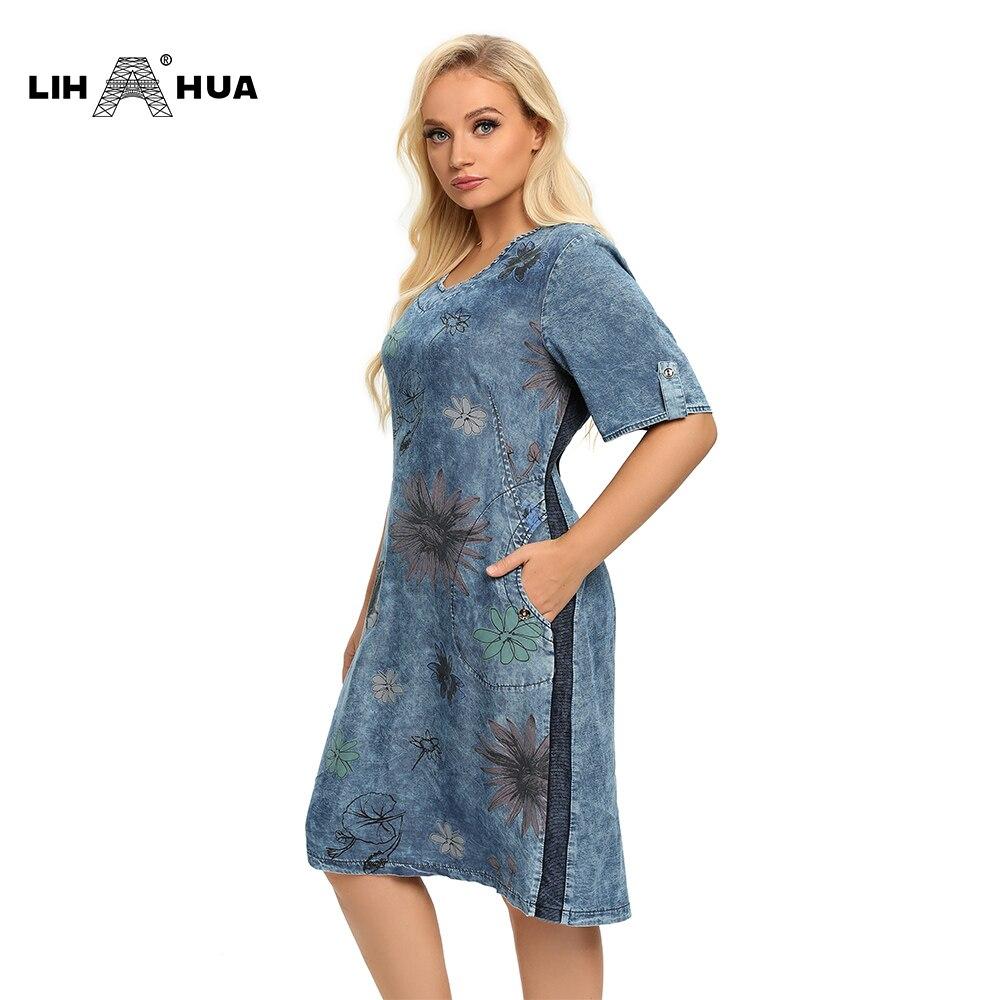A stylish Women's Plus Size Denim Dress featuring a floral pattern, V-neckline, and short sleeves, perfect for summer casual wear.