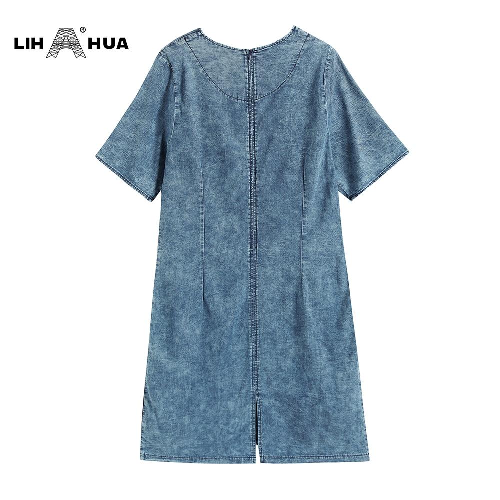 A stylish Women's Plus Size Denim Dress featuring a floral pattern, V-neckline, and short sleeves, perfect for summer casual wear.
