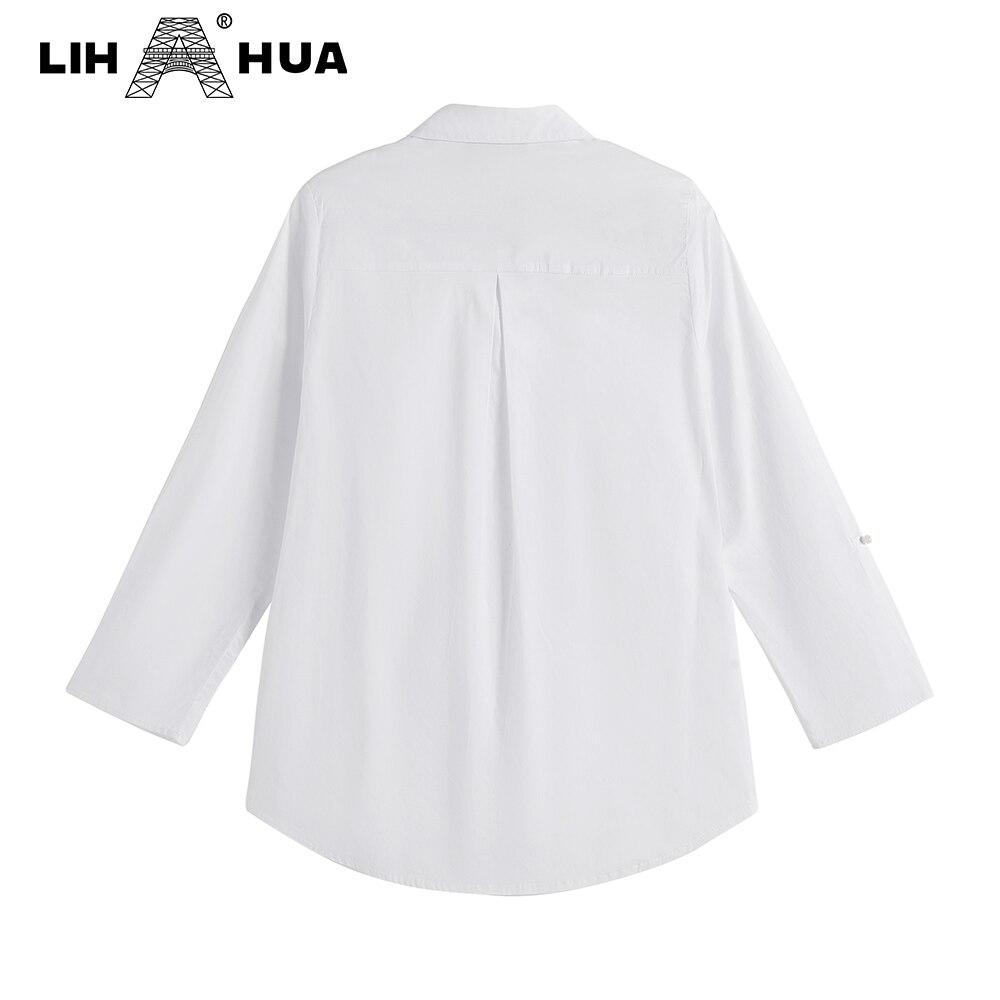 Women's plus size spring shirt featuring an elastic beaded lapel tie button, made from lightweight cotton with embroidered flares.