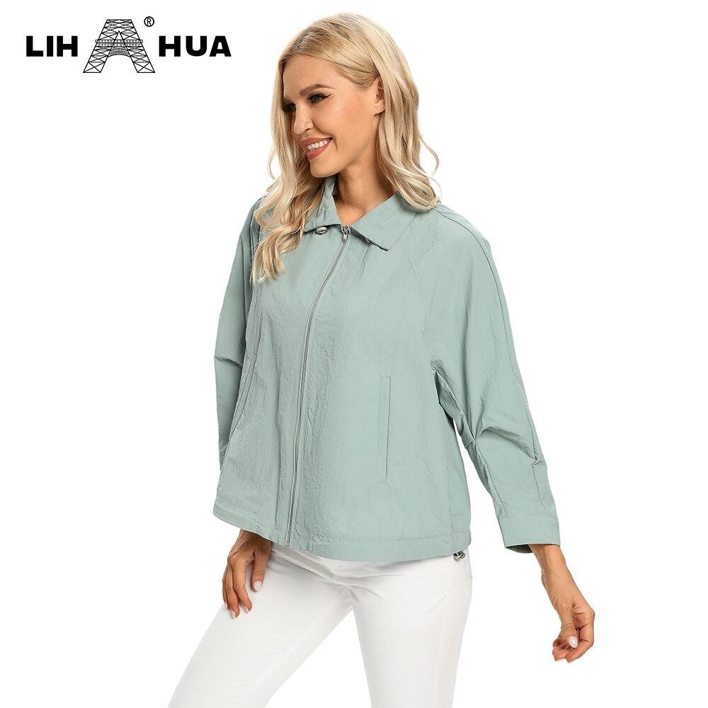 Women's Plus Size Windbreaker Short Lapel Jacket in denim fabric, featuring a zipper closure and turn-down collar, perfect for spring and autumn.