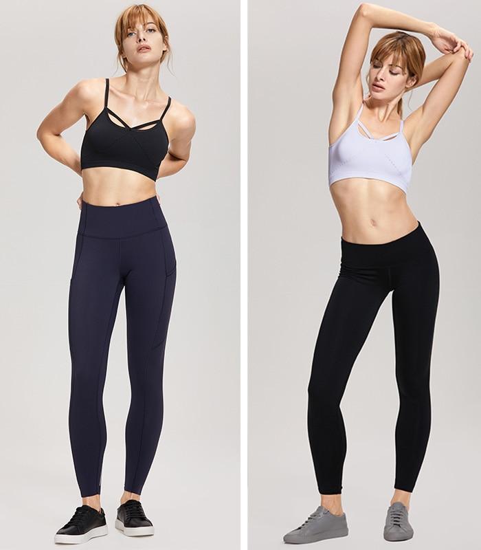 Women's seamless yoga bra top with removable pads and cross strappy back design in black, white, and gray purple colors.