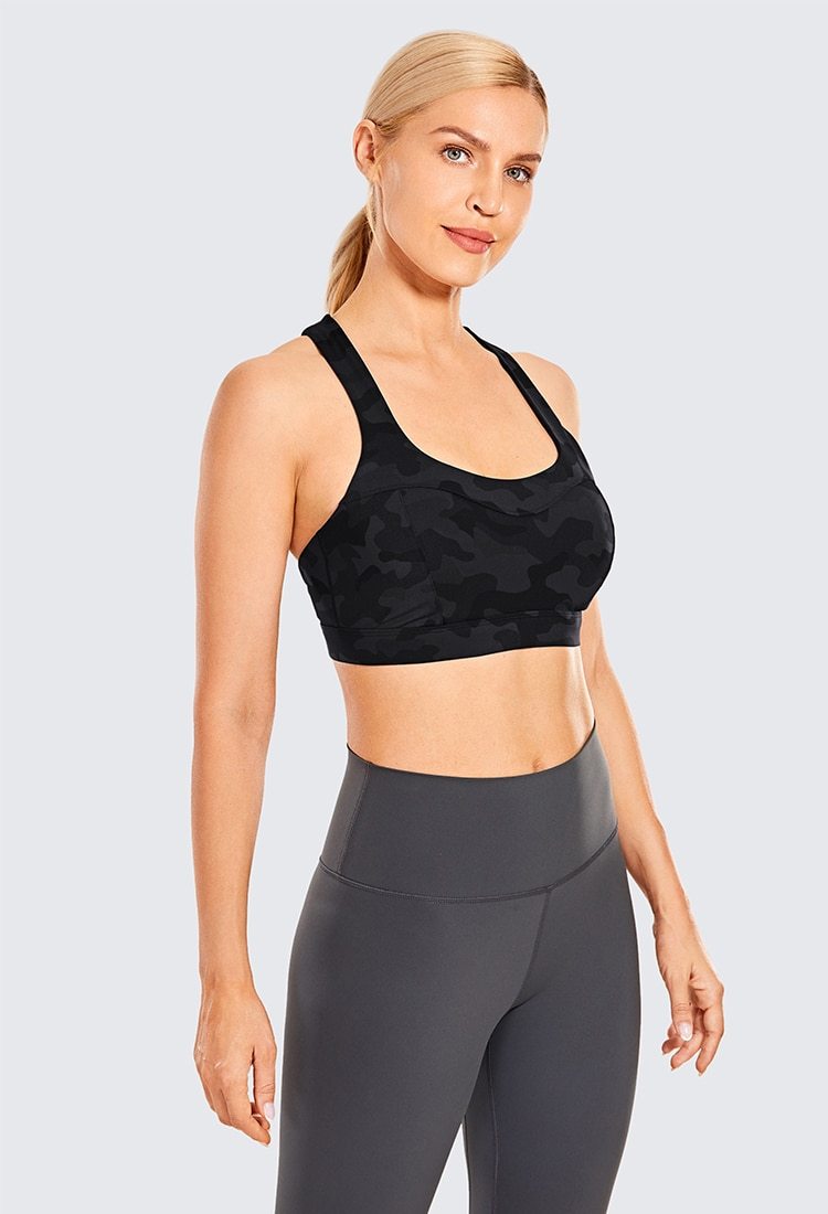 Women's Sexy Stappy Sports Bra featuring a stylish strappy back design, wireless padded support, and anti-sweat material, available in various sizes.