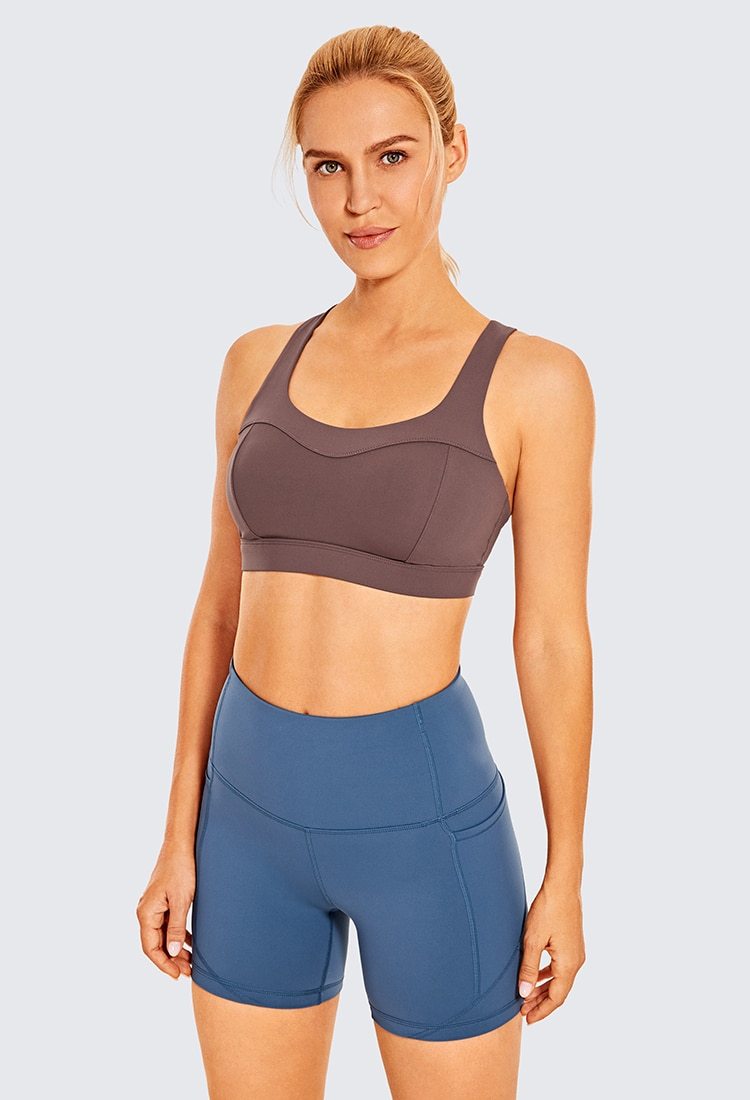 Women's Sexy Stappy Sports Bra featuring a stylish strappy back design, wireless padded support, and anti-sweat material, available in various sizes.