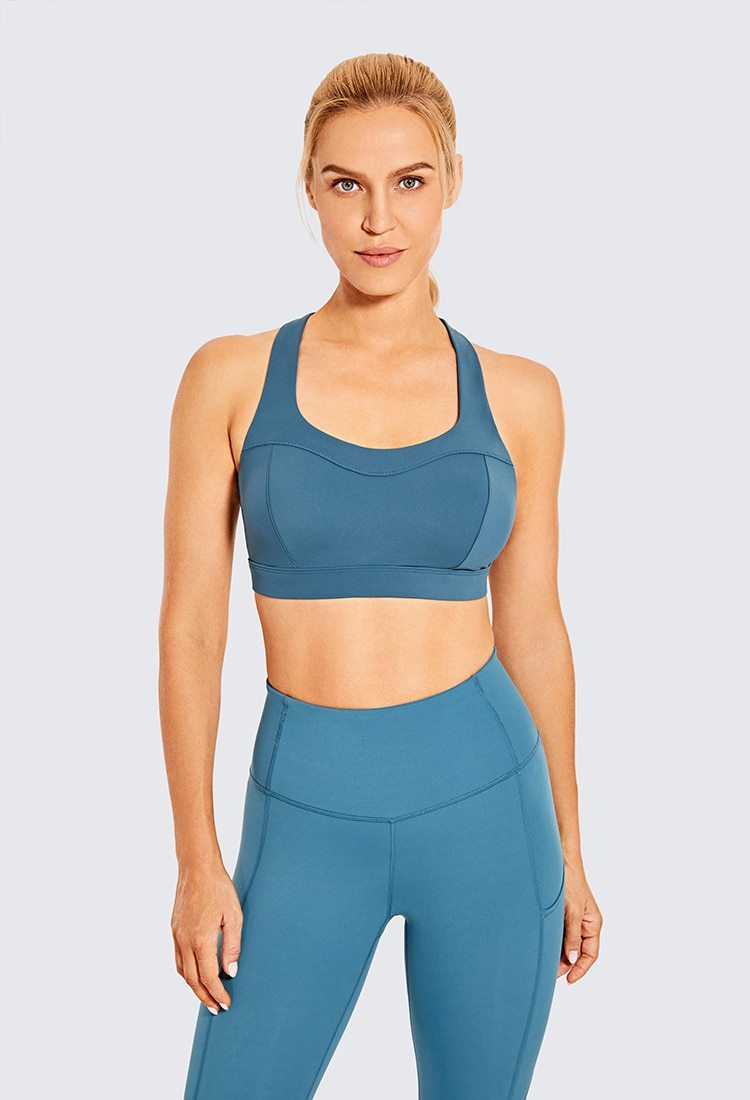 Women's Sexy Stappy Sports Bra featuring a stylish strappy back design, wireless padded support, and anti-sweat material, available in various sizes.